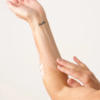 The BOA Skin Care Smart Natural Exfoliant being used on an arm.