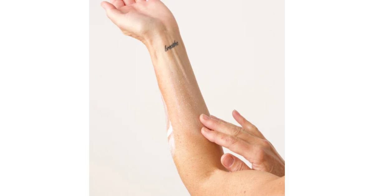 The BOA Skin Care Smart Natural Exfoliant being used on an arm.