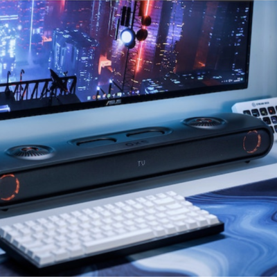The OXS Thunder 7.1.2 Sound Gaming System connected to a monitor.