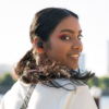 The SkullCandy Grind True Wireless Earbuds being worn.