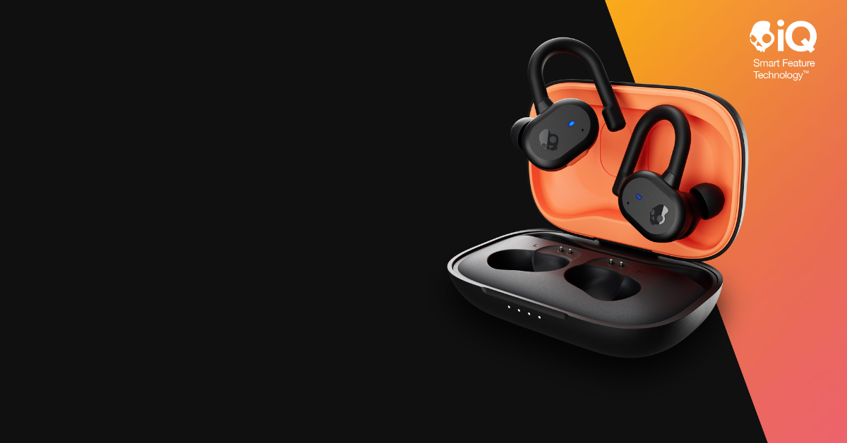 The Skullcandy Push Active True Wireless Earbuds in a black and orange color.