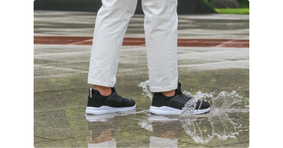 The Loom Waterproof Sneakers being worn in water.