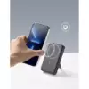 The Anker 633 Magnetic Battery being connected to a phone.