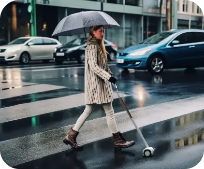 An image of a woman using Glide while crossing the street in the rain.