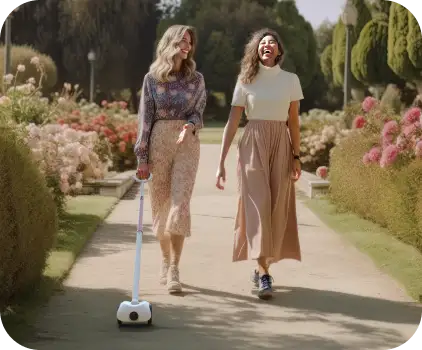 An image of a woman using Glide to walk through a park with a friend.